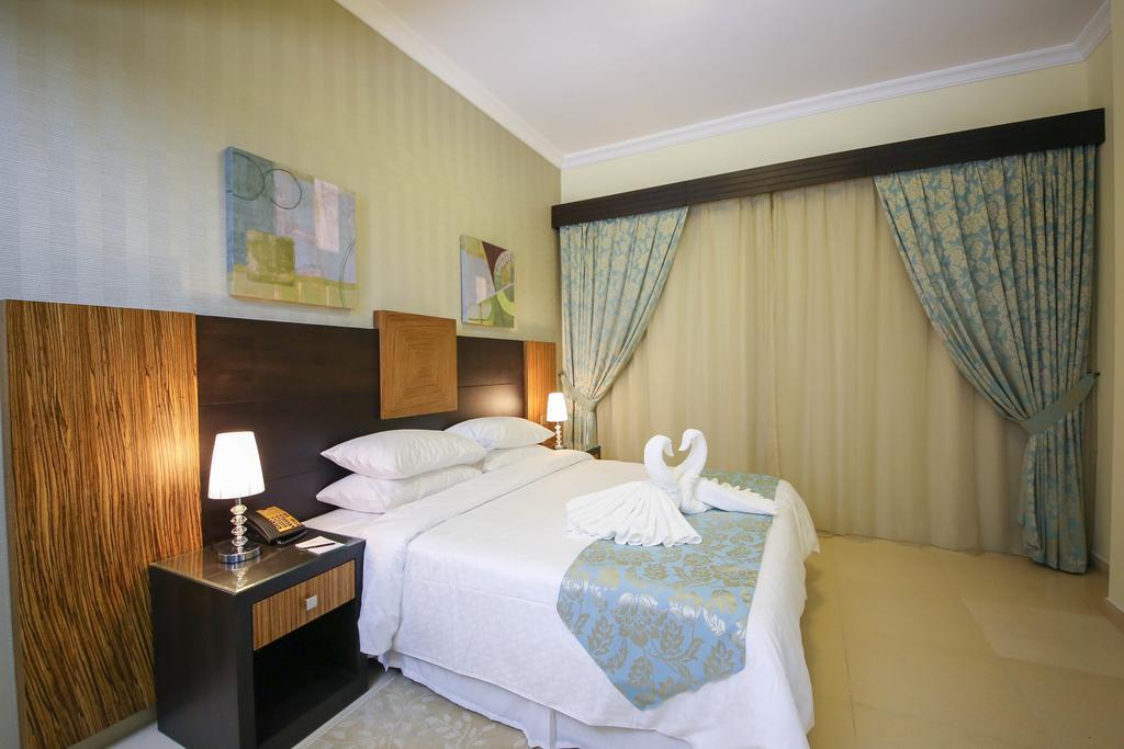 Ivory Grand Hotel Apartments Dubai Buitenkant foto